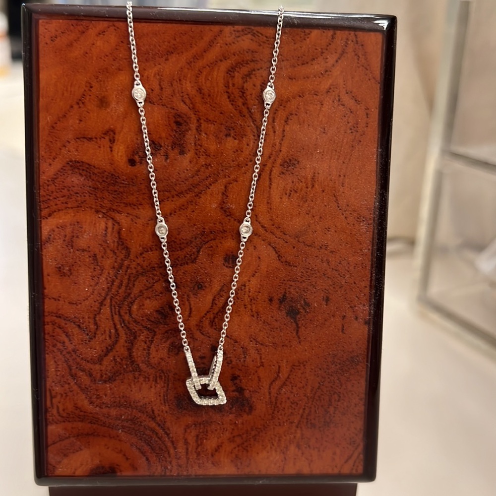 14 white gold .80 ctw diamond station necklace